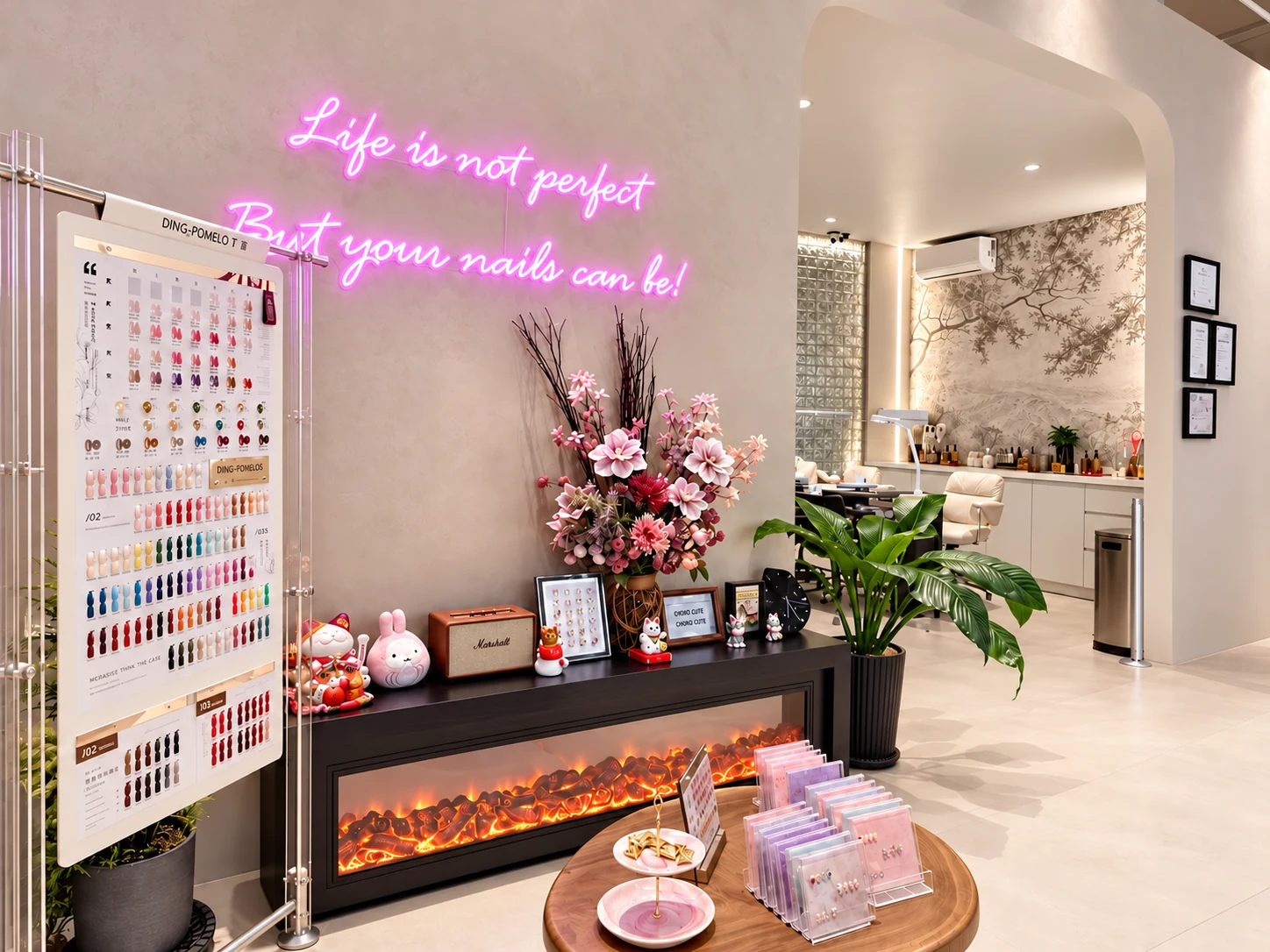 Tutuunails waiting area with a pink neon sign, nail colour display, flowers and fireplace